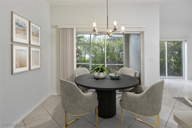 tiled dining area with plenty of natural light and a chandelier