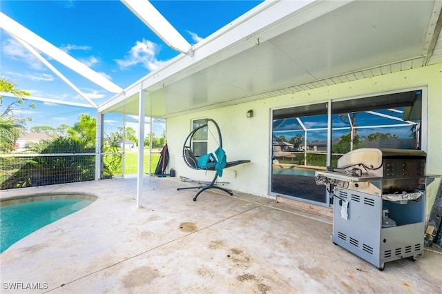 view of patio with a fenced in pool and a lanai