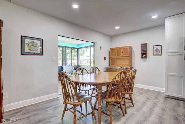 dining room with light hardwood / wood-style floors