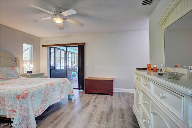 bedroom with access to exterior, ceiling fan, and light wood-type flooring