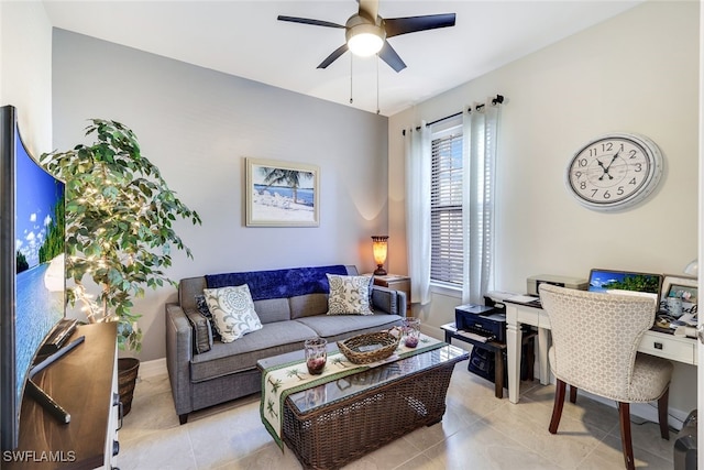 living room with ceiling fan and light tile patterned floors