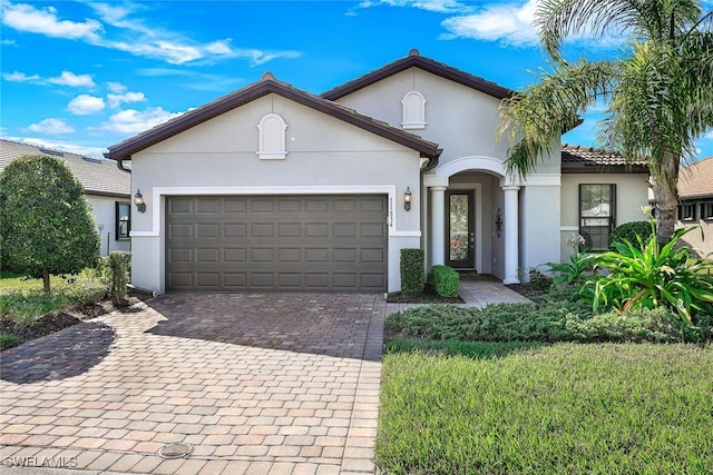 view of front of house with a garage