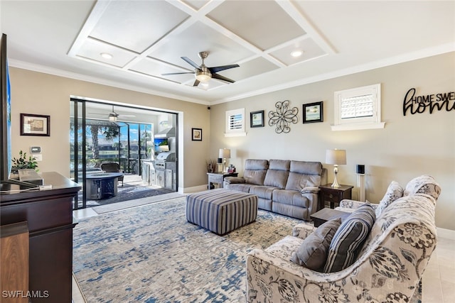 tiled living room featuring ceiling fan, ornamental molding, and coffered ceiling