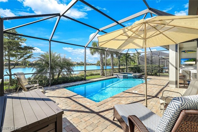 view of swimming pool with a patio area, an in ground hot tub, a water view, and glass enclosure