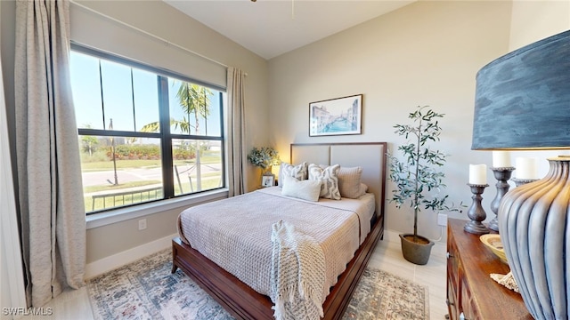 bedroom with multiple windows