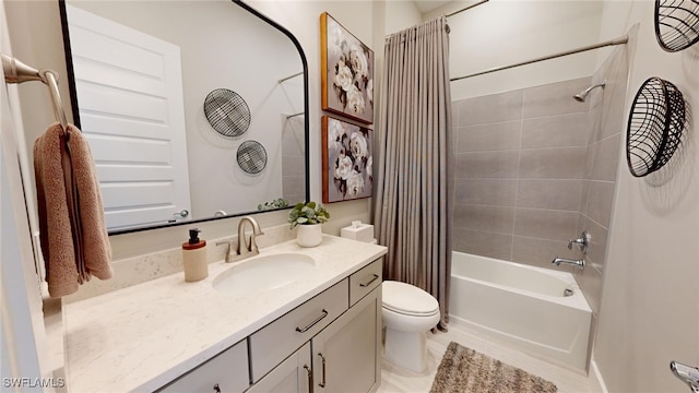 full bathroom featuring toilet, shower / bath combo with shower curtain, and vanity