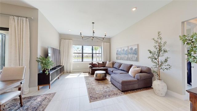 living room with a notable chandelier and light tile patterned flooring