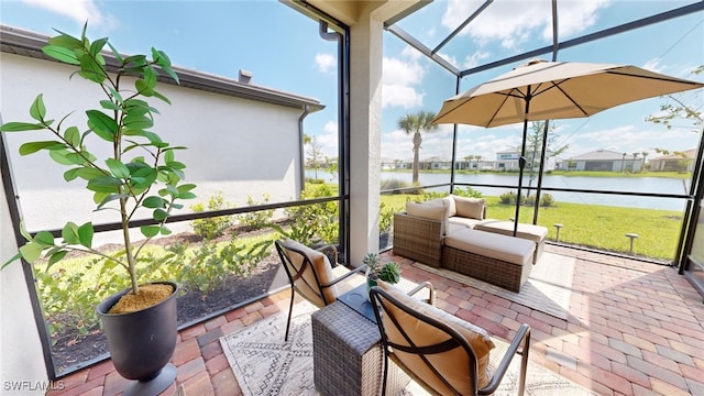 sunroom / solarium with a water view