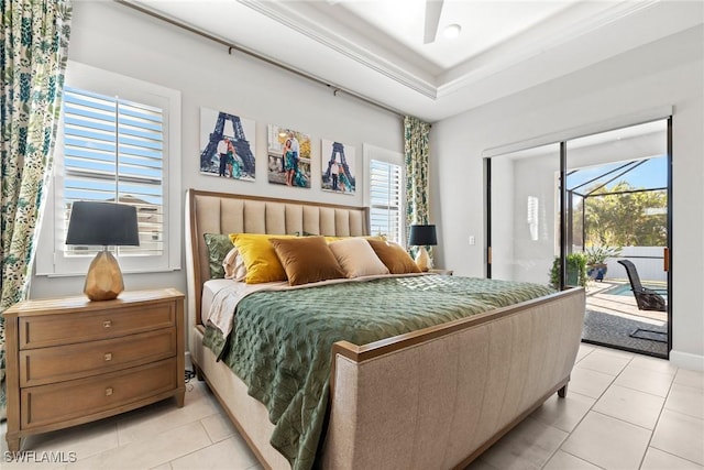 bedroom featuring multiple windows, light tile patterned floors, access to outside, and ceiling fan