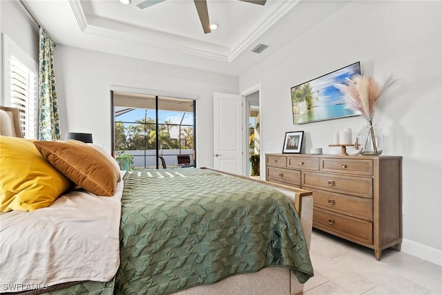 tiled bedroom featuring access to outside, ceiling fan, a tray ceiling, and ornamental molding