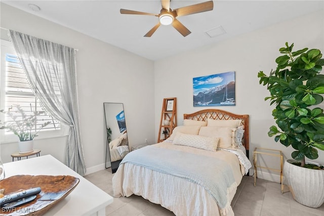 bedroom featuring ceiling fan and light tile patterned floors