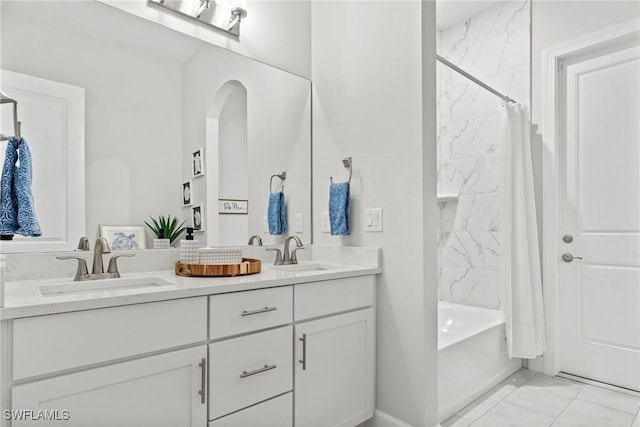 bathroom featuring vanity and shower / bath combo with shower curtain