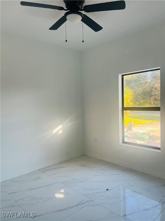 empty room featuring ceiling fan