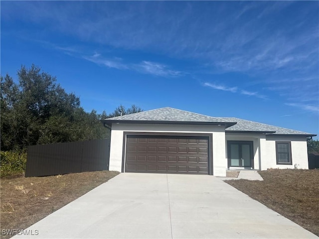 view of front of property featuring a garage