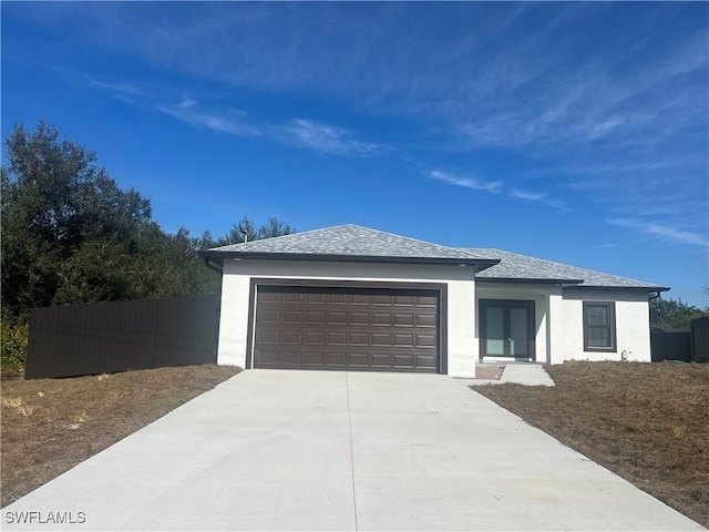 view of front of property featuring a garage