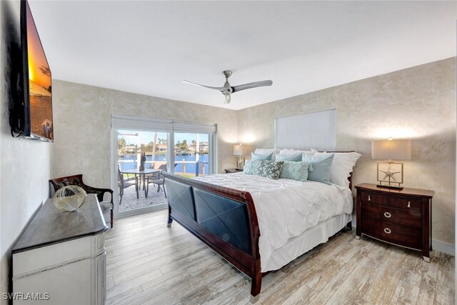 bedroom featuring ceiling fan, access to exterior, and light wood-type flooring