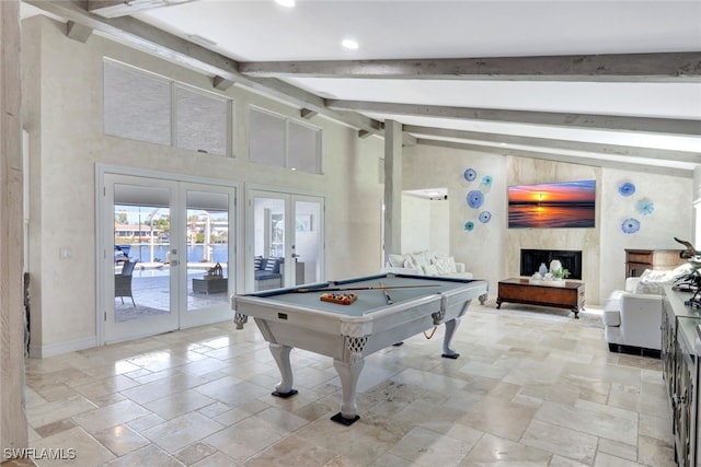 rec room with french doors, high vaulted ceiling, beamed ceiling, a fireplace, and pool table