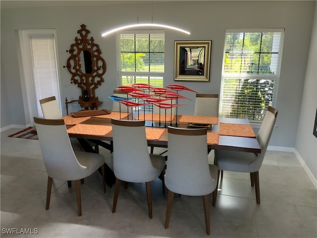 dining room featuring light tile patterned floors