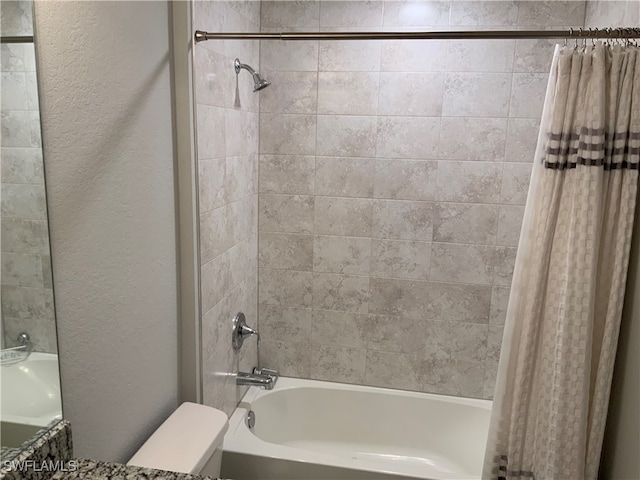 bathroom with shower / tub combo