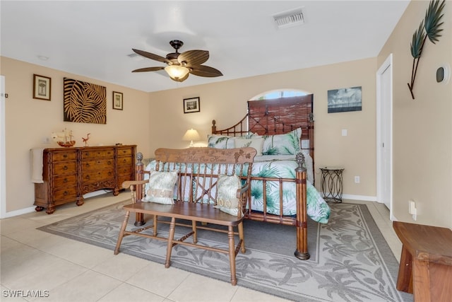 bedroom with light tile patterned floors and ceiling fan