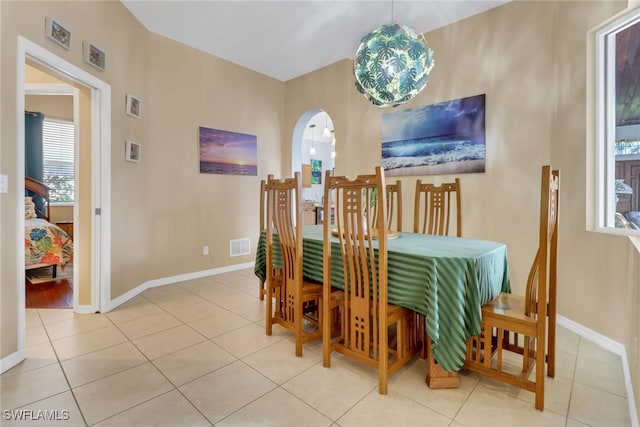 dining area with light tile patterned floors