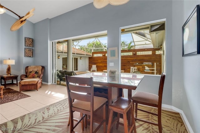 dining space with light tile patterned floors