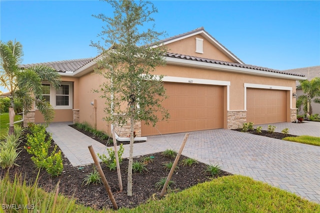 view of front of property featuring a garage