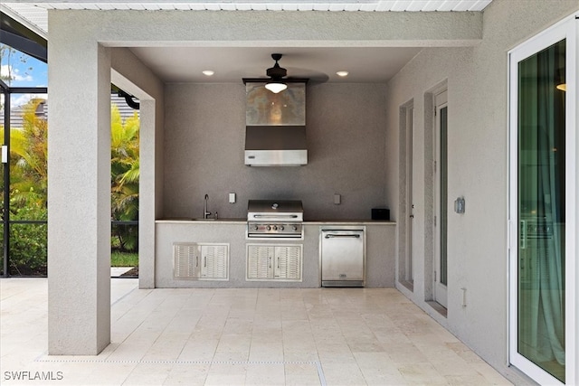 view of patio with grilling area, sink, ceiling fan, a lanai, and exterior kitchen