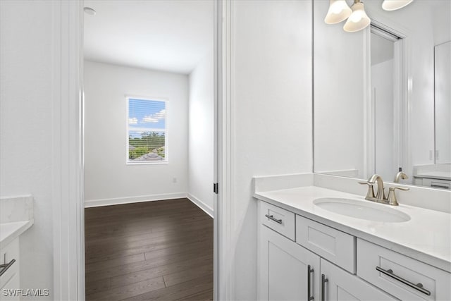 bathroom featuring vanity and hardwood / wood-style flooring