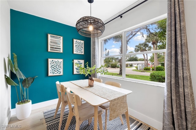 dining room with hardwood / wood-style flooring