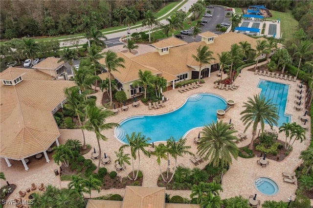 view of swimming pool featuring a patio area