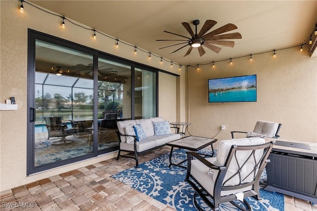 view of patio / terrace featuring an outdoor living space and ceiling fan