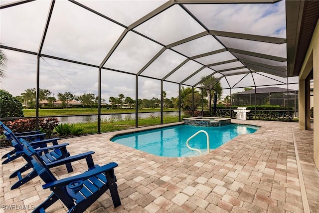 view of pool featuring glass enclosure, a patio area, and a water view