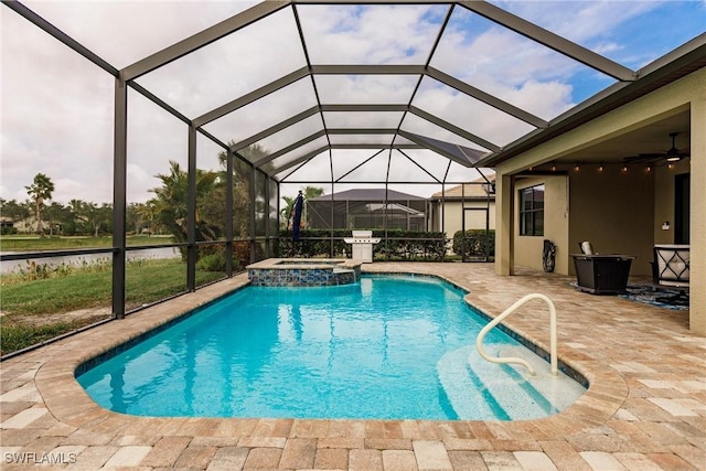 view of pool featuring area for grilling, a lanai, and a patio area