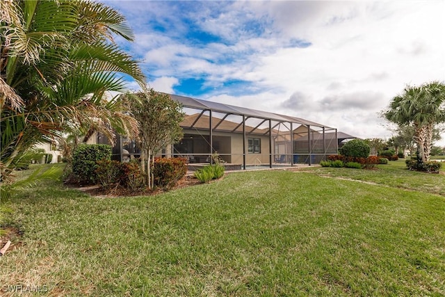 11041 Castlereagh St, Fort Myers, FL 33913 - back of house with glass enclosure and a yard