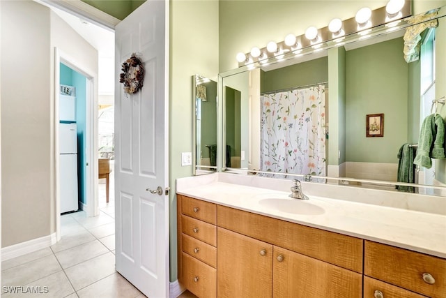 bathroom featuring vanity and tile patterned floors