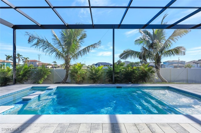 view of pool featuring a lanai