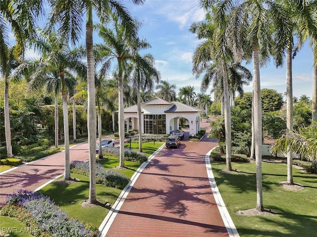 7817 Vizcaya Way, Naples, FL 34108 - view of home's community with a yard