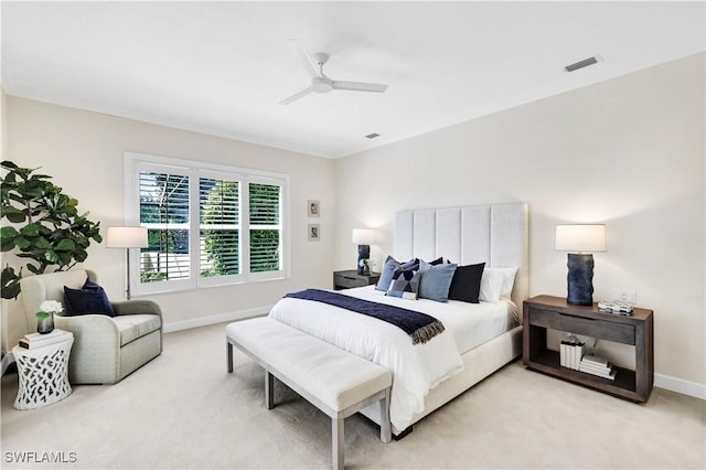 7817 Vizcaya Way, Naples, FL 34108 - bedroom with light colored carpet, baseboards, and a ceiling fan