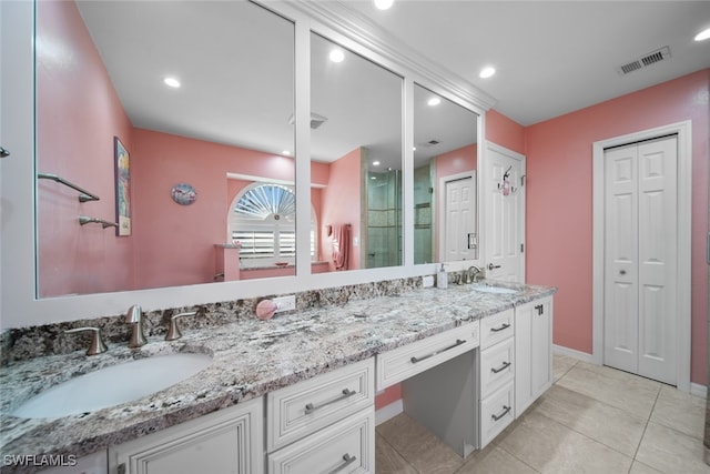 bathroom featuring vanity and tile patterned floors