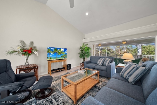 living room with high vaulted ceiling and ceiling fan