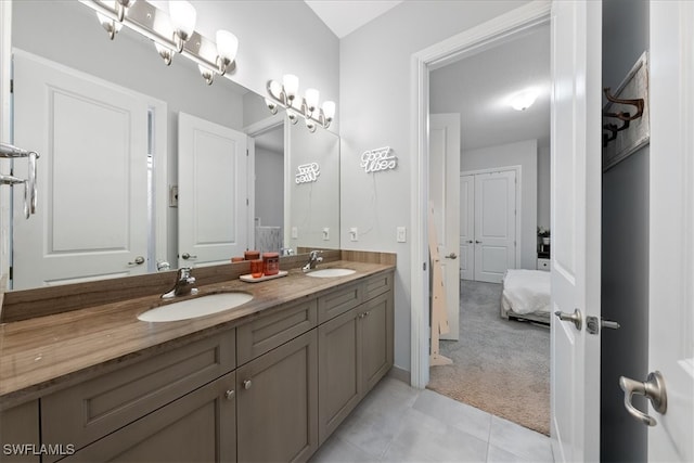 bathroom with vanity and tile patterned flooring