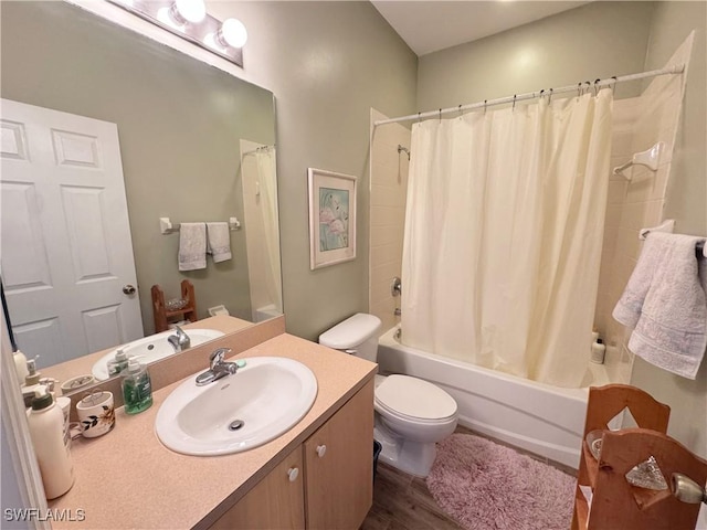 15393 Bellamar Cir Unit 522, Fort Myers, FL 33908 - bathroom featuring shower / tub combo with curtain, toilet, wood finished floors, and vanity