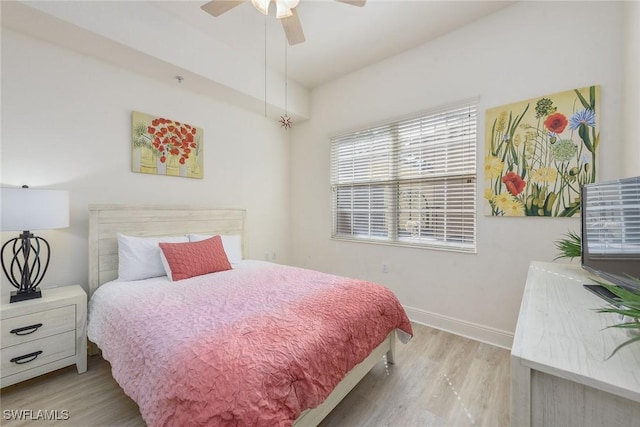 bedroom featuring light hardwood / wood-style flooring and ceiling fan