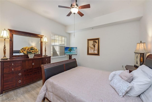 3745 Montreux Ln Unit 102, Naples, FL 34114 - bedroom with light wood-style flooring and ceiling fan