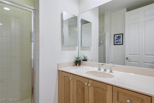 bathroom featuring vanity and walk in shower