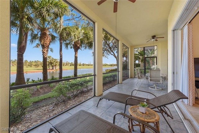 sunroom with plenty of natural light and ceiling fan