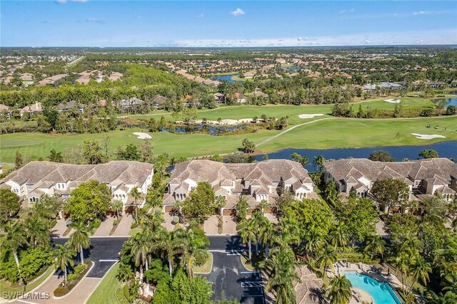 3745 Montreux Ln Unit 102, Naples, FL 34114 - aerial perspective of suburban area featuring a local golf course and a large body of water
