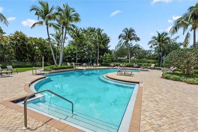 view of swimming pool featuring a patio