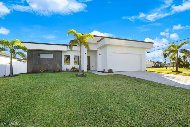 modern home with a front yard and a garage